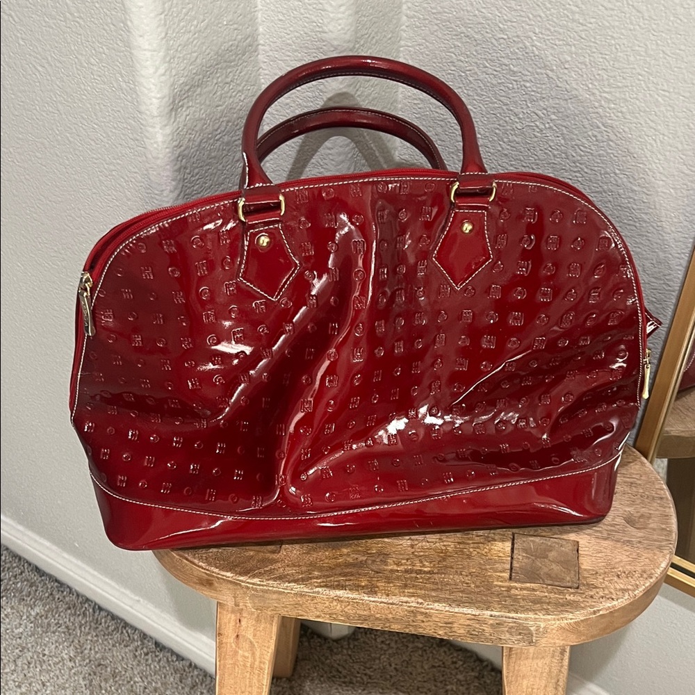Elegant Red Patent Leather Overnight Bag